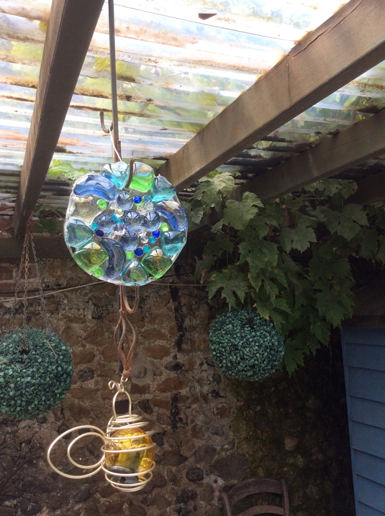 Sun catcher made from mixed glass pebbles